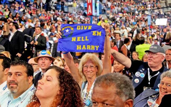 Laurie Haley, treasurer of the Washoe County Democratic Party, holds up a cloth sign she brought to cheer on Sen. Harry Reid during his speech to the Democratic National Convention in Charlotte, N.C., Tuesday night.